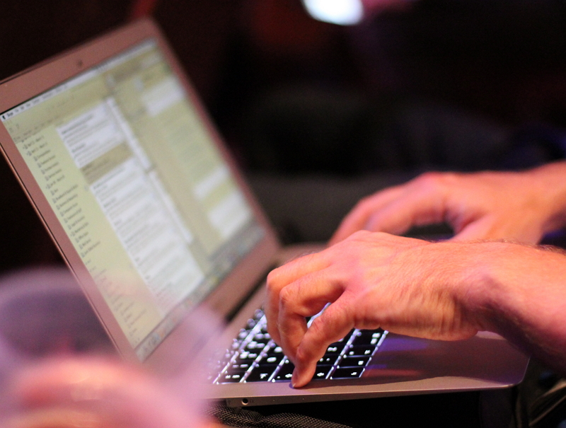 Person typing on a laptop